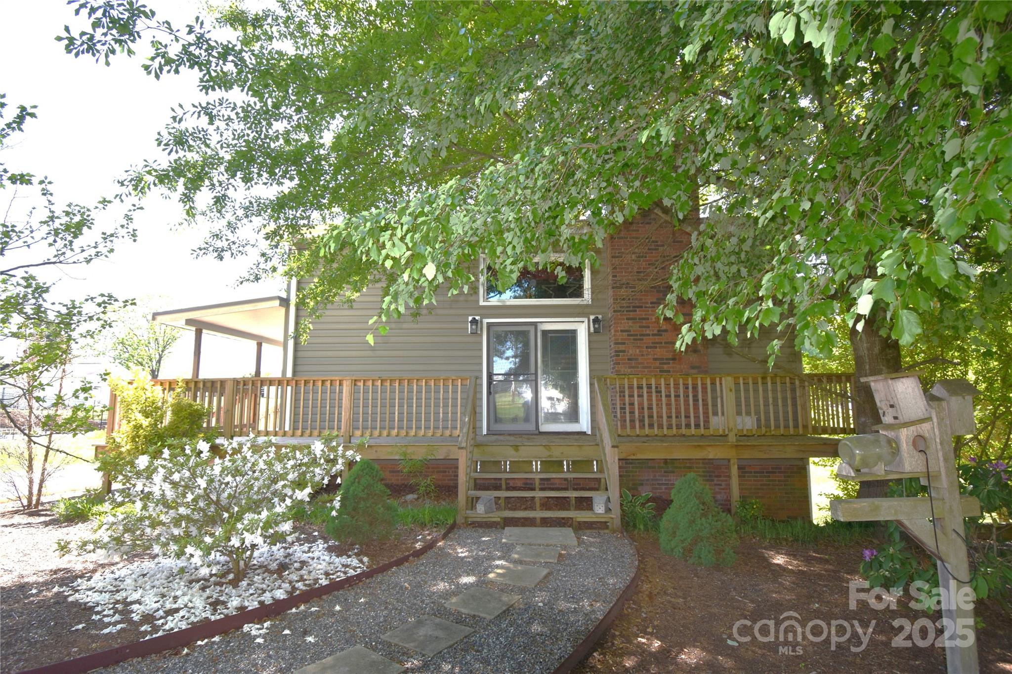 5769 Birch Street Conover, NC 28613 - Photo 3 of 45 a front view of a house with garden