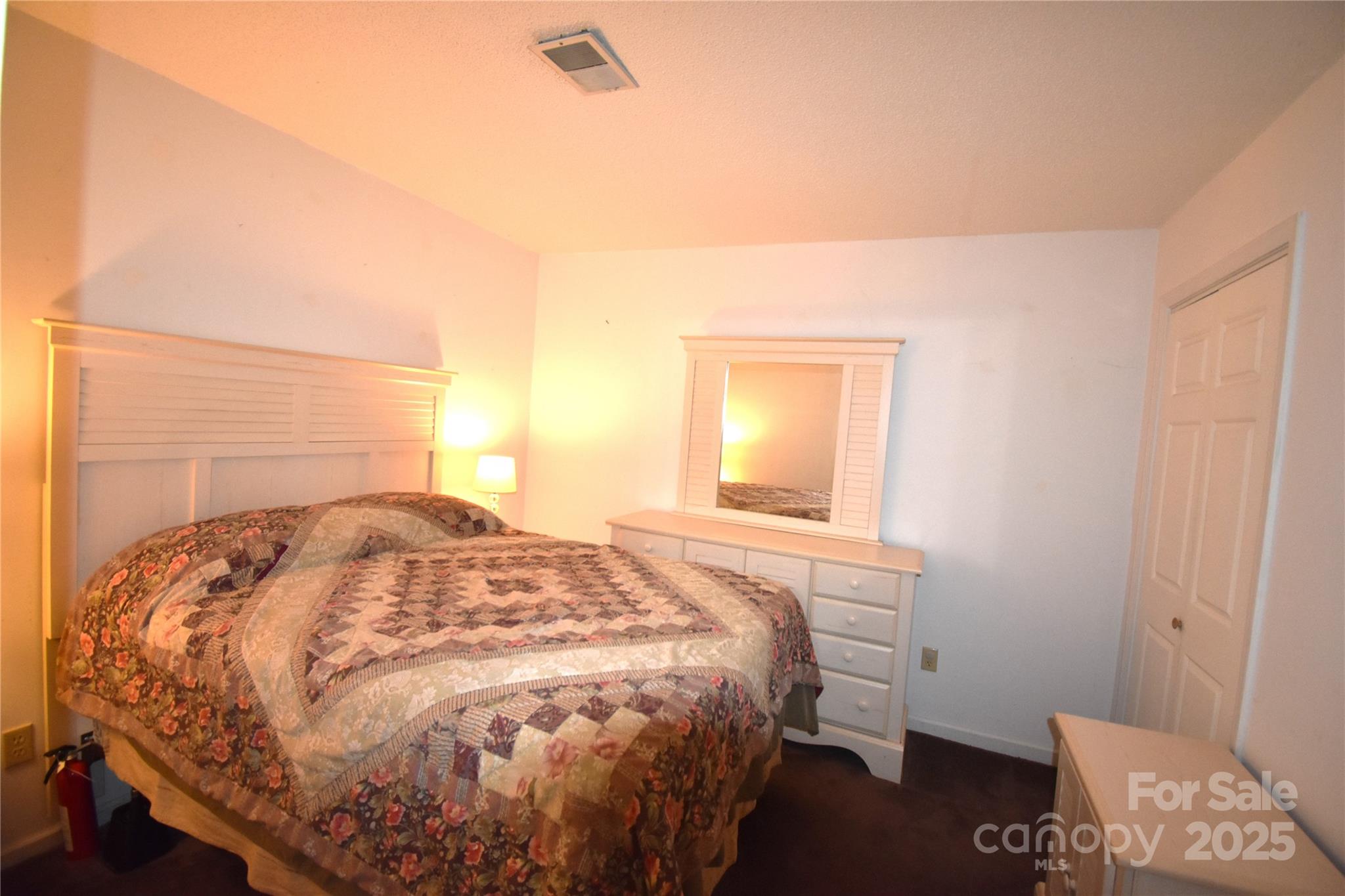 5769 Birch Street Conover, NC 28613 - Photo 32 of 45 a bedroom with a bed and a window