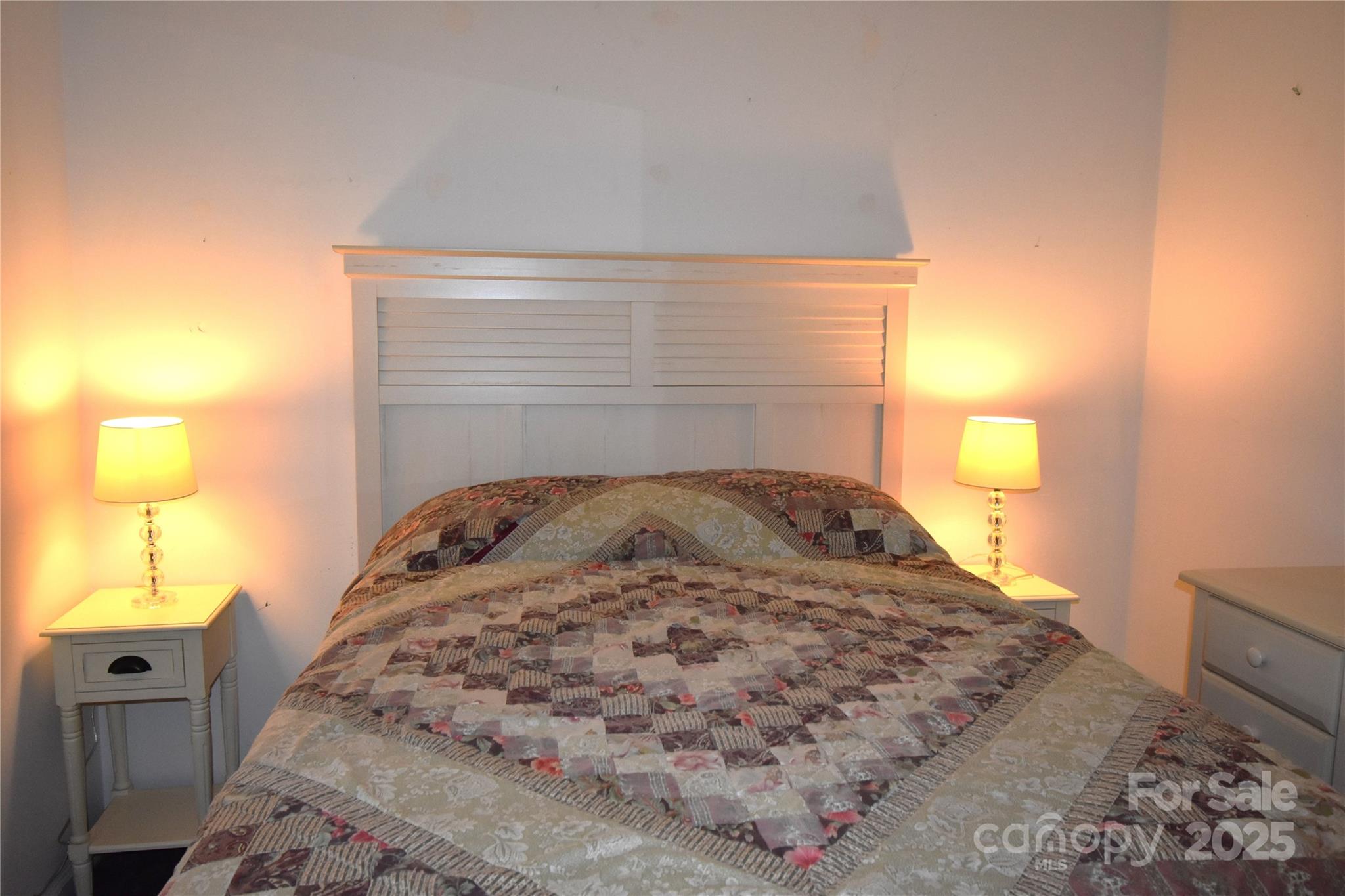 5769 Birch Street Conover, NC 28613 - Photo 34 of 45 a bedroom with a bed and a lamp
