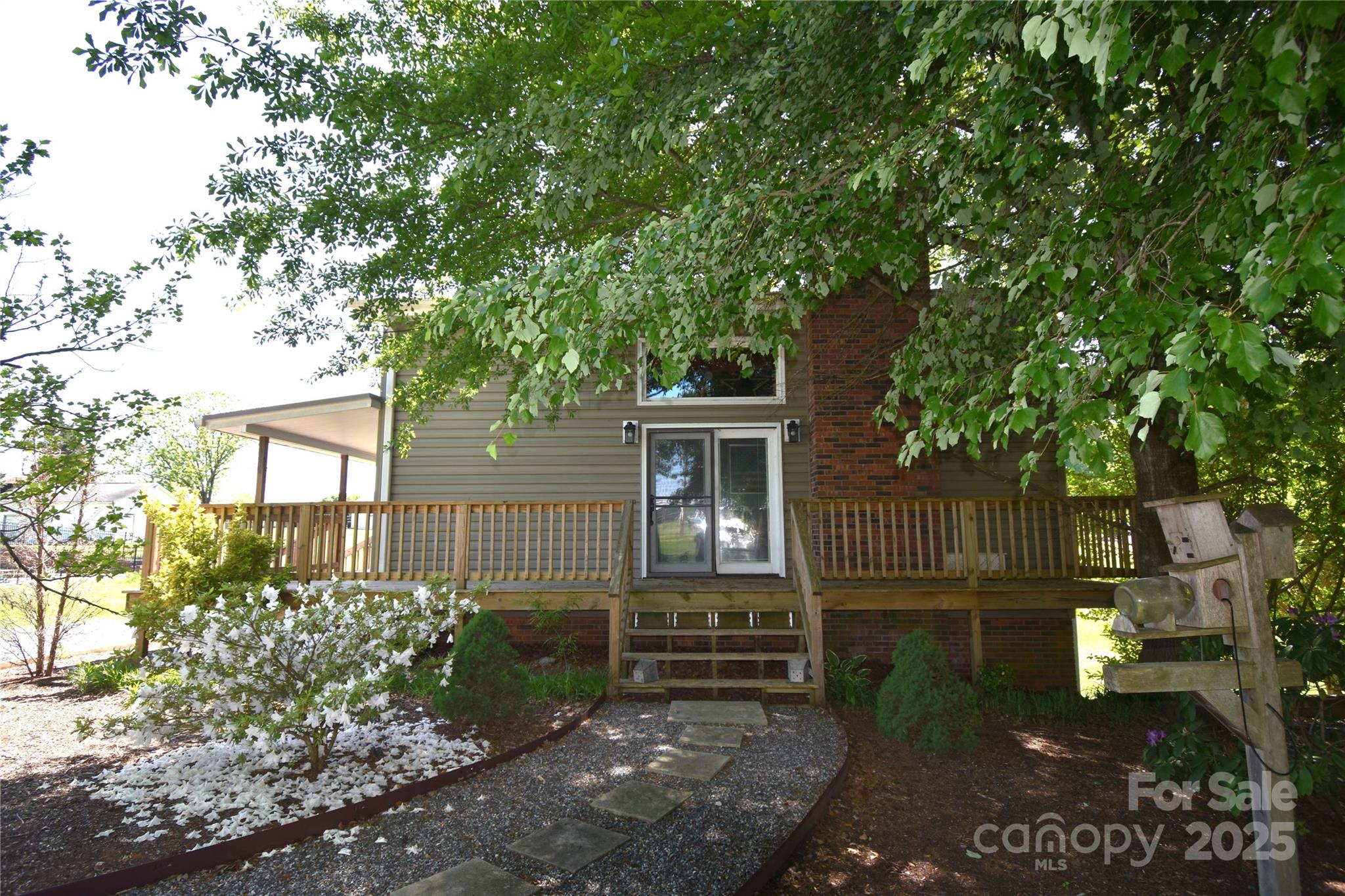 5769 Birch Street Conover, NC 28613 - Photo 37 of 45 a front view of a house with garden