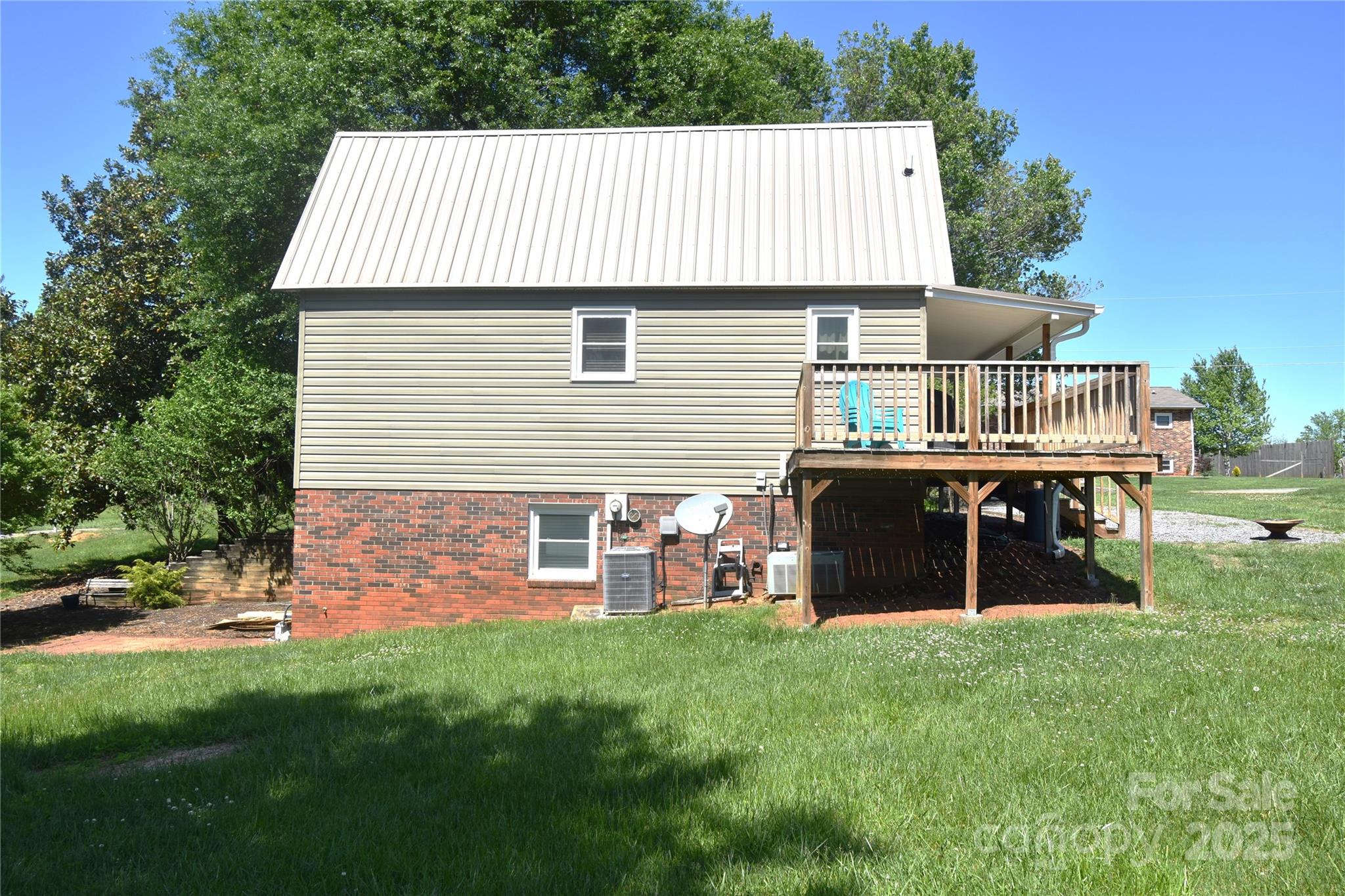 5769 Birch Street Conover, NC 28613 - Photo 41 of 45 a backyard of a house with table and chairs