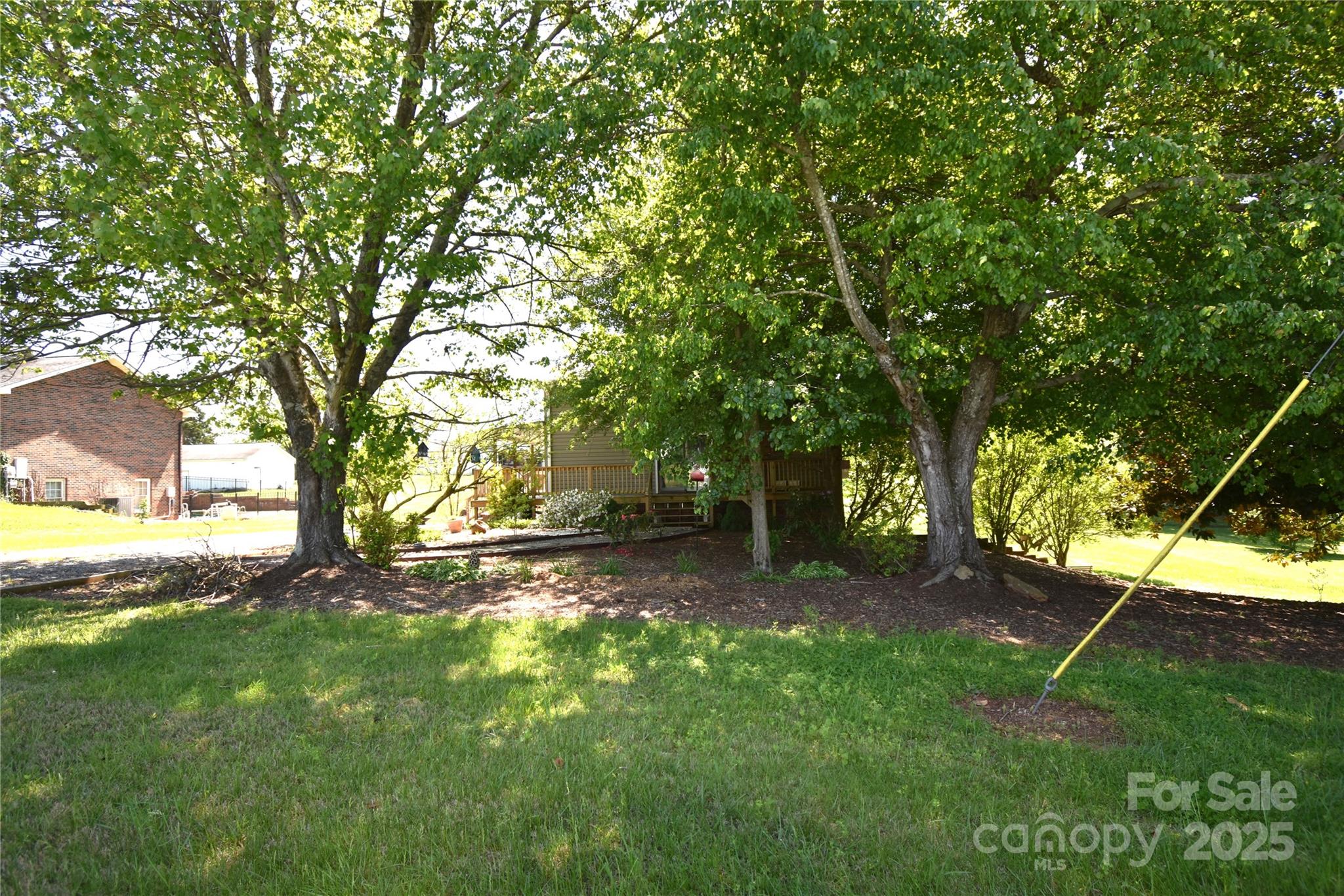 5769 Birch Street Conover, NC 28613 - Photo 43 of 45 a view of a yard with a tree