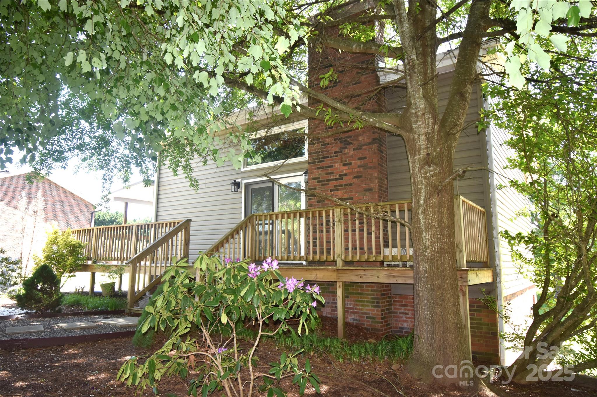 5769 Birch Street Conover, NC 28613 - Photo 5 of 45 a house with a tree in front of it