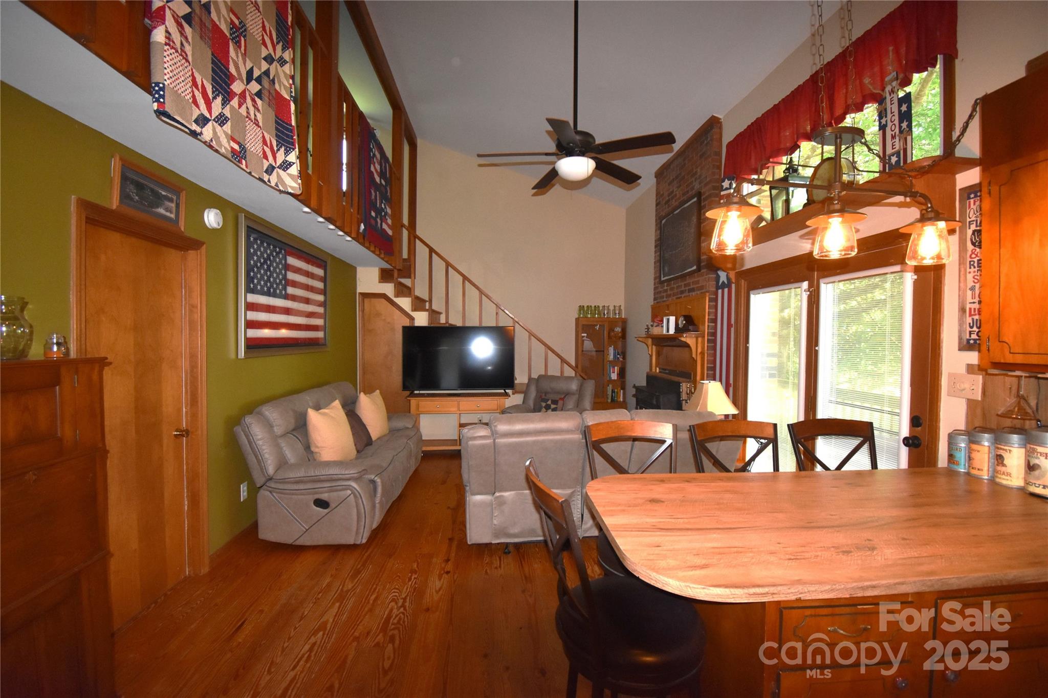 5769 Birch Street Conover, NC 28613 - Photo 10 of 45 a living room with furniture and a flat screen tv