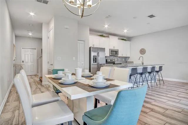 a view of a dining room with furniture