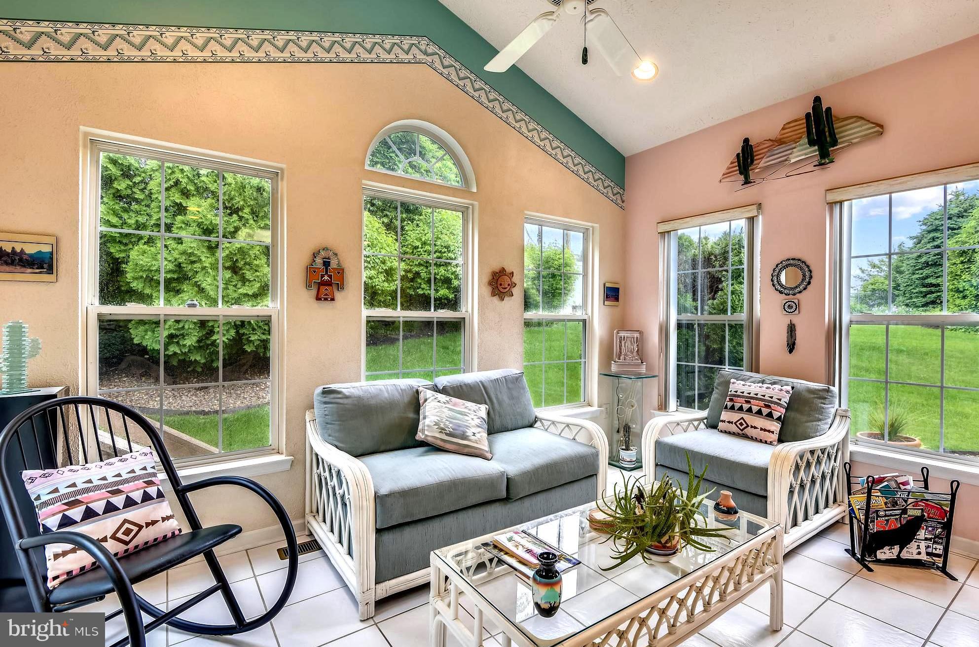 1401 Bretton View Road Annapolis, MD 21409 - Photo 22 of 52 Tiled Sunroom . Designer Ceiling Fans Throughout