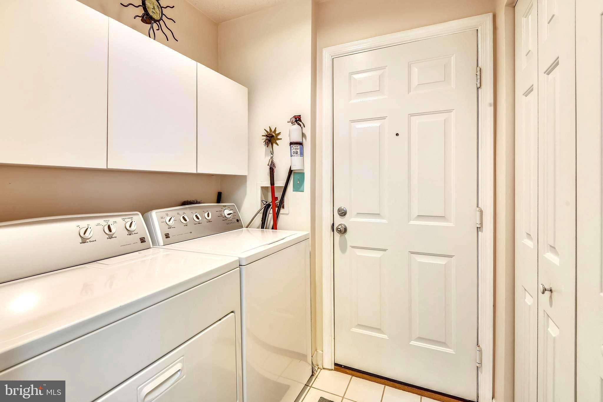 1401 Bretton View Road Annapolis, MD 21409 - Photo 29 of 52 Main Level Laundry Room with Storage Cabinetry