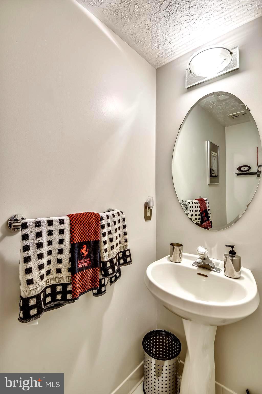 1401 Bretton View Road Annapolis, MD 21409 - Photo 34 of 52 Lower Level Half Bath with Pedestal Sink