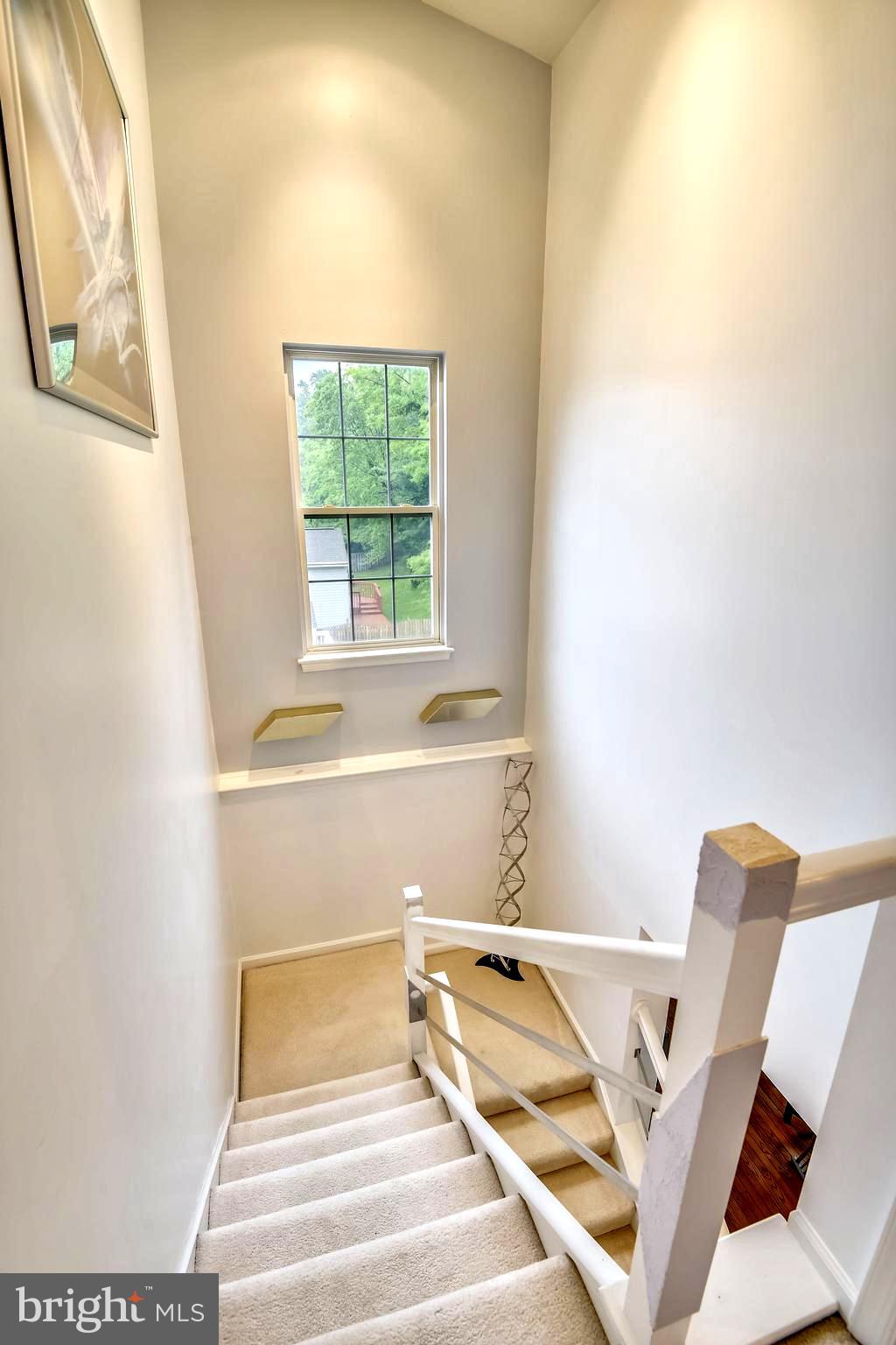 1401 Bretton View Road Annapolis, MD 21409 - Photo 35 of 52 Soaring Staircase to Upper Bedroom Level