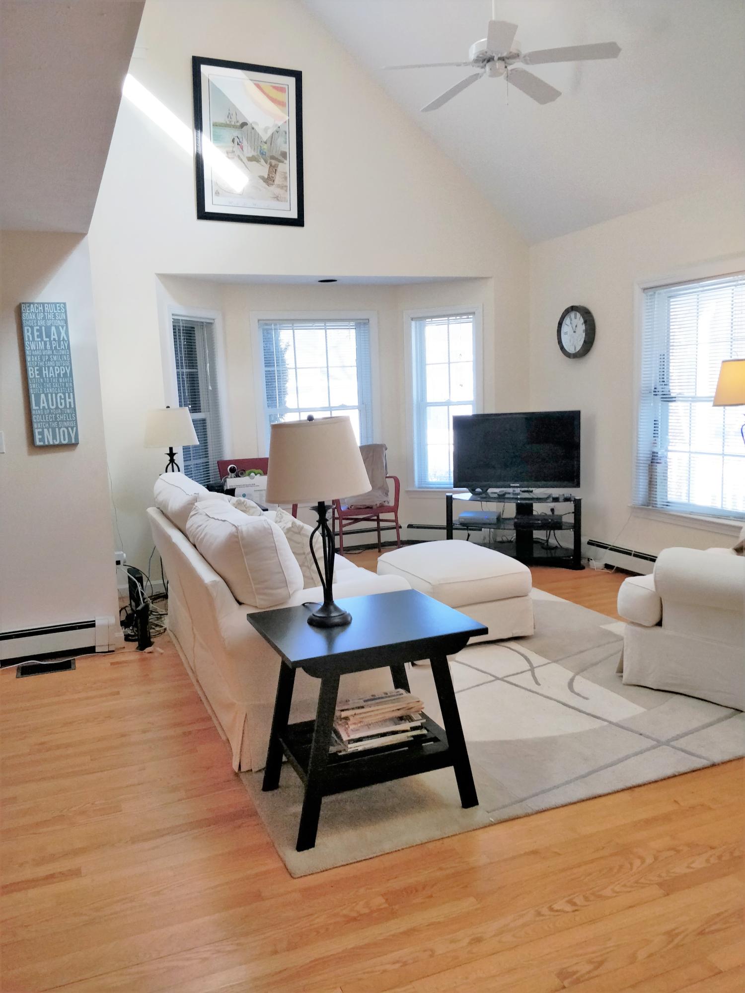 149 Spinnaker Ridge Drive, Unit 45 Wells, ME 04090 - Photo 7 of 27 LR w/cathedral ceiling.