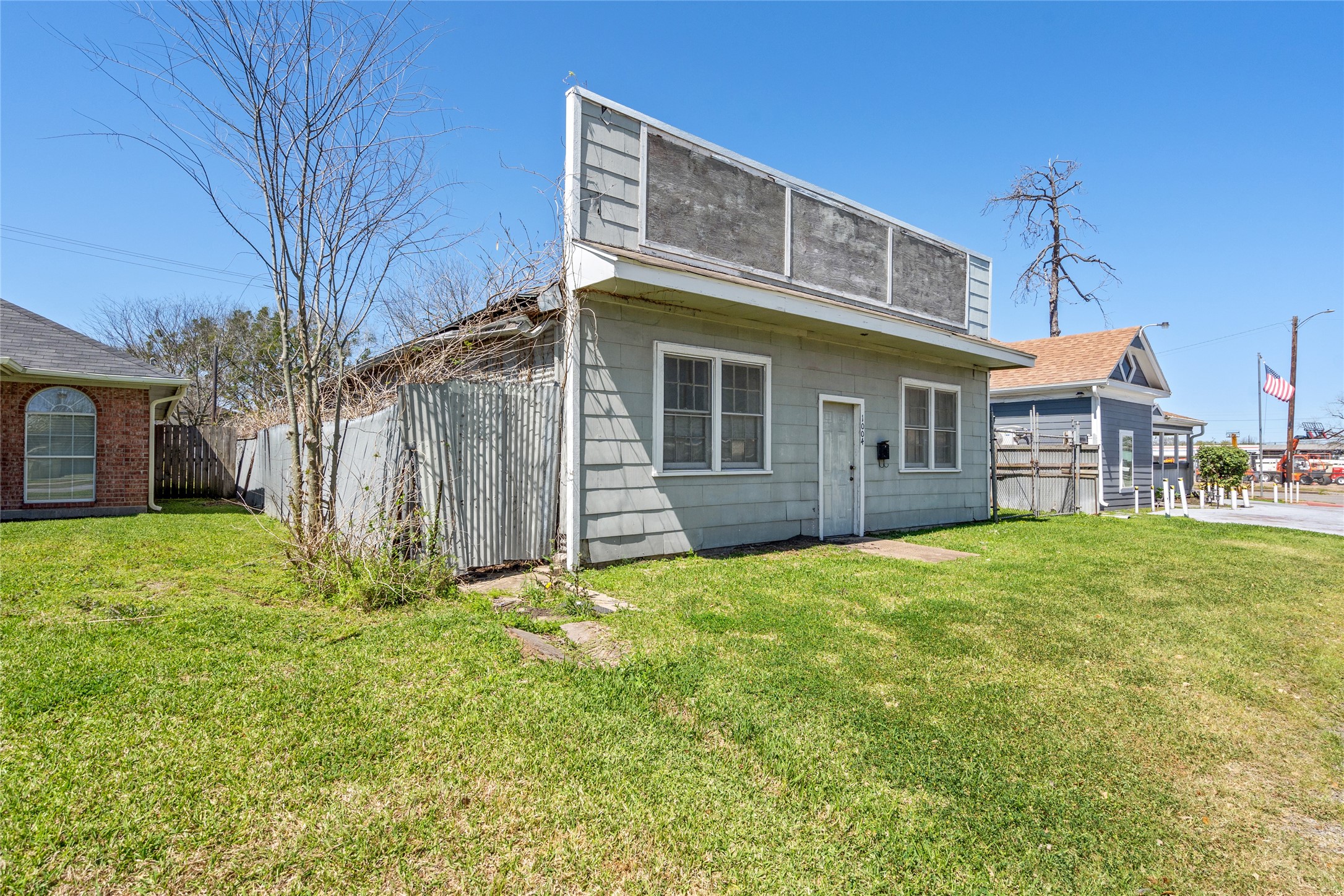 1004 Houston Street Rosenberg, TX 77471 - Photo 14 of 18 a view of a house with a yard