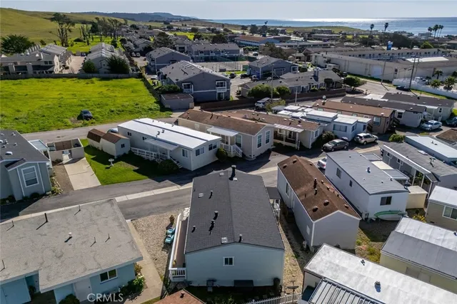 an aerial view of a house with a garden