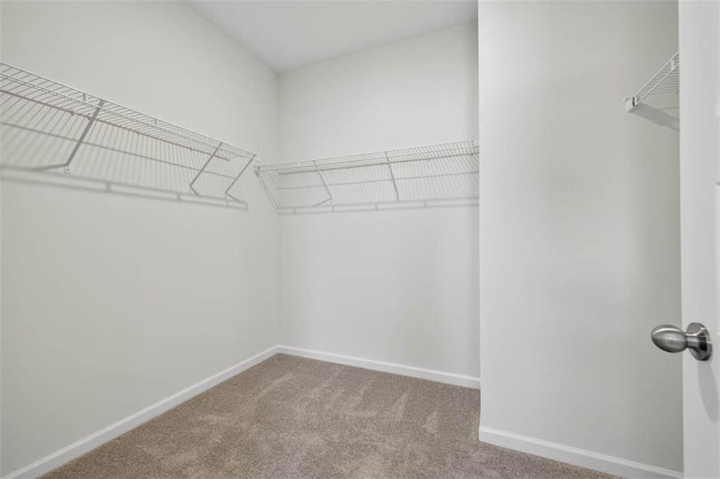 498 Guy Williams Road Rock Spring, GA 30739 - Photo 34 of 42 a view of a room with racks on the wall