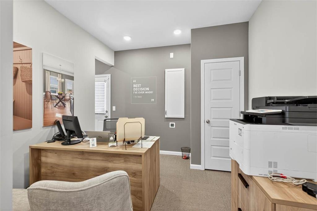 498 Guy Williams Road Rock Spring, GA 30739 - Photo 38 of 42 a living room with furniture and wooden floor