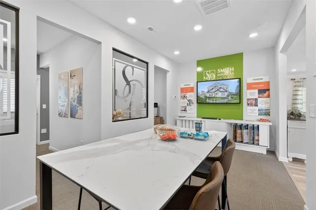 a view of a dining room with furniture