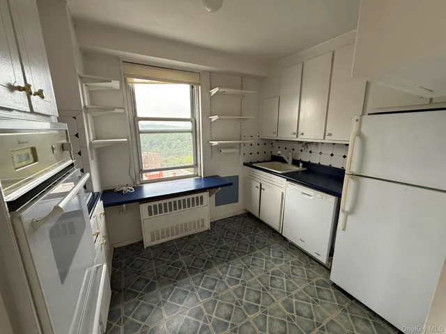 a balcony with view of city