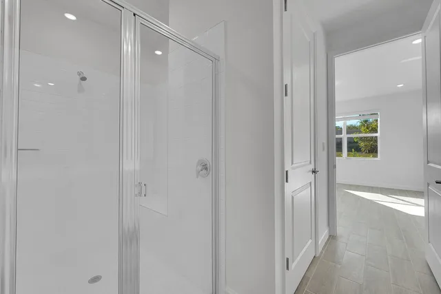 a view of a bathroom with shower