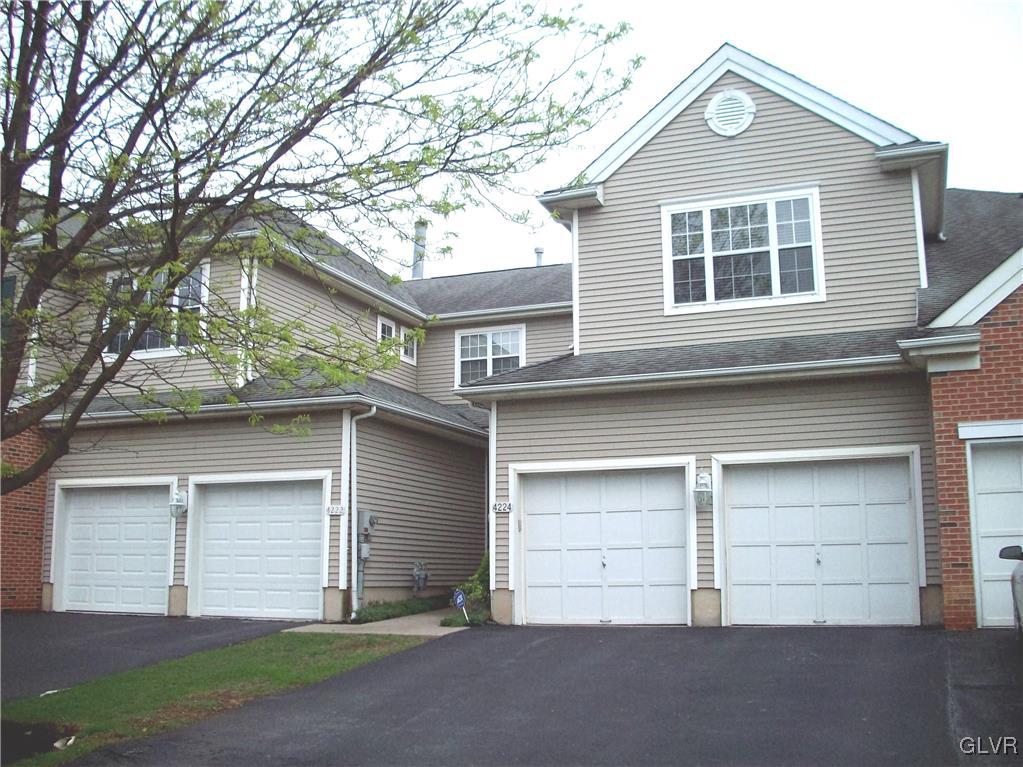 4224 Creek Road Allentown, PA 18104 - Photo 1 of 19 a front view of a house with a yard and garage