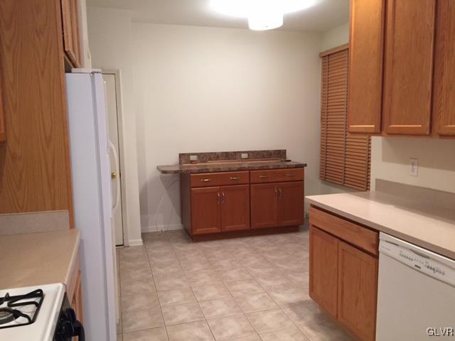 4224 Creek Road Allentown, PA 18104 - Photo 8 of 19 a kitchen with a cabinets and white appliances