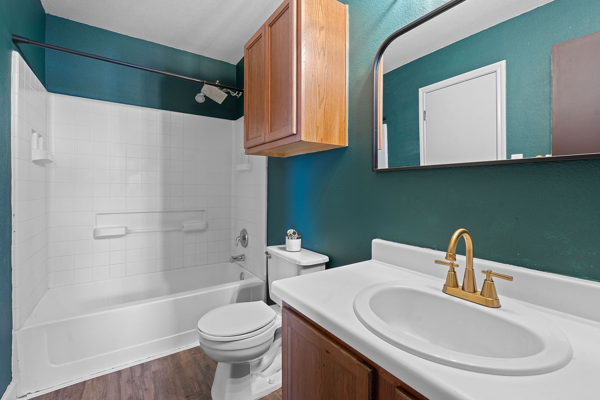 229 Black Forest Road Buda, TX 78610 - Photo 20 of 32 a bathroom with a sink a toilet and shower