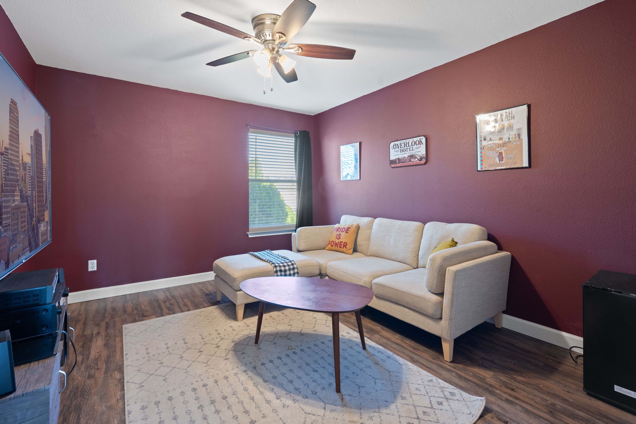 229 Black Forest Road Buda, TX 78610 - Photo 22 of 32 a living room with furniture and a potted plant