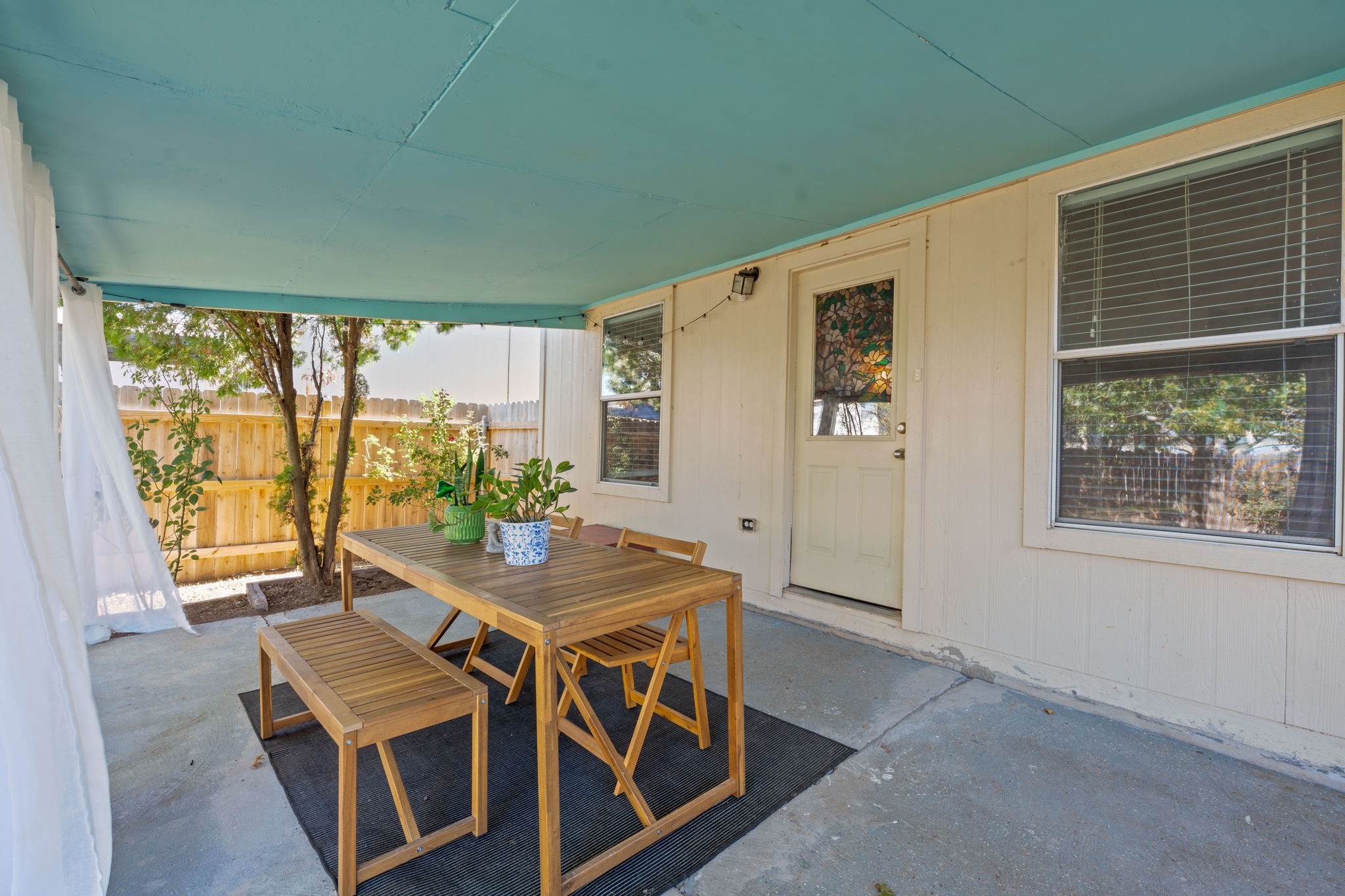 229 Black Forest Road Buda, TX 78610 - Photo 29 of 32 a view of a dining room with furniture window and outside view