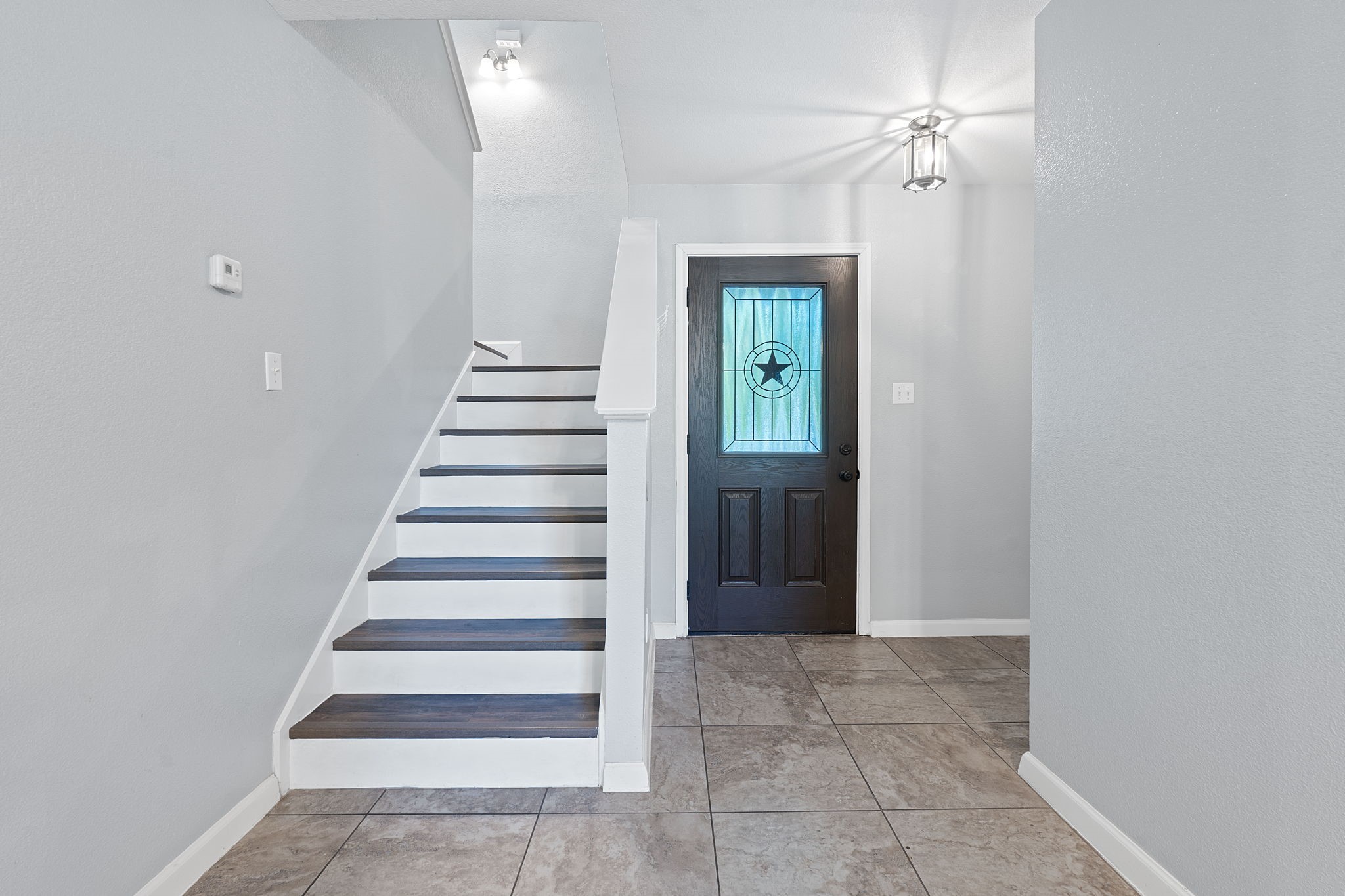 229 Black Forest Road Buda, TX 78610 - Photo 4 of 32 a view of entryway with stairs