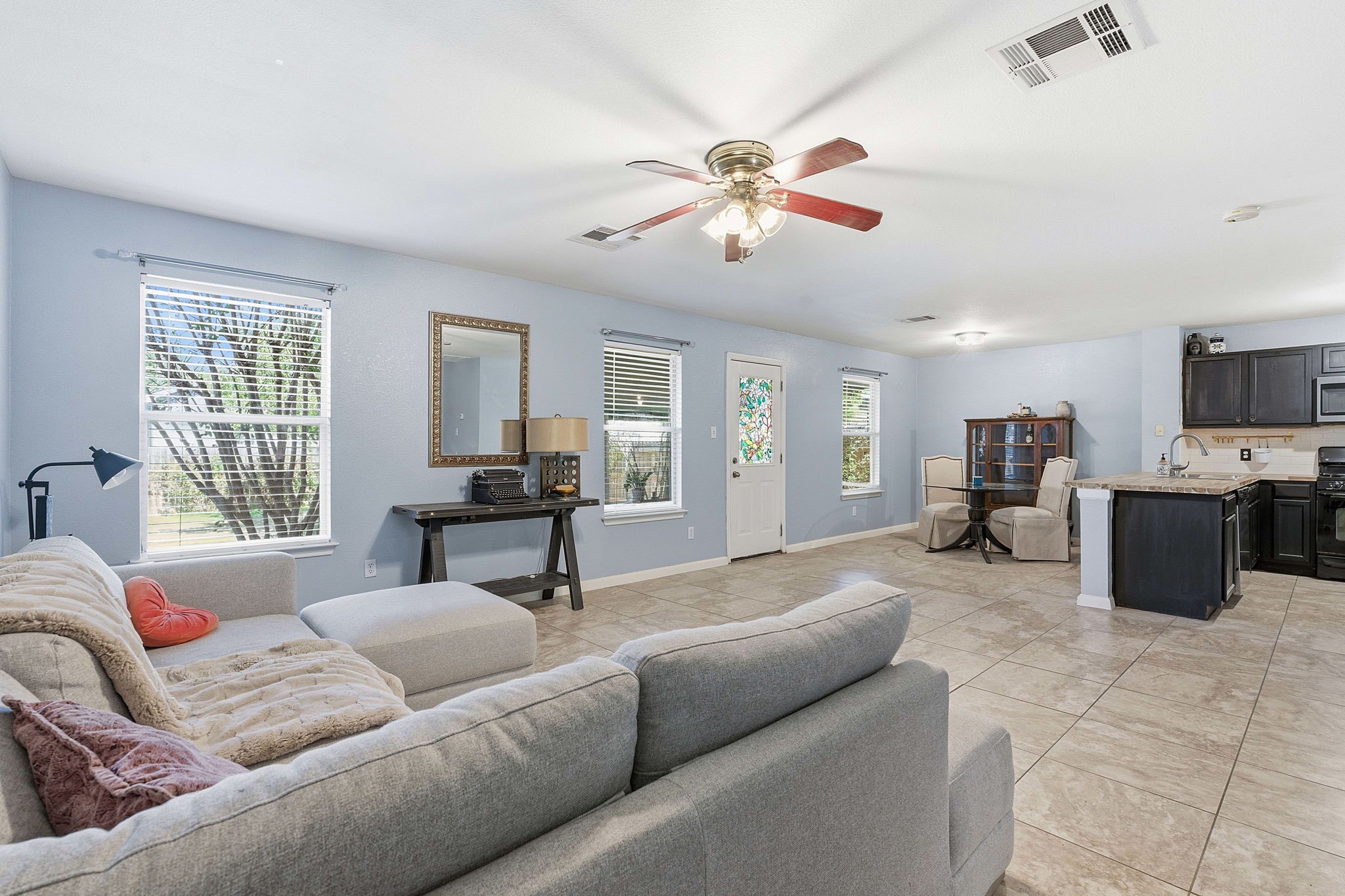 229 Black Forest Road Buda, TX 78610 - Photo 5 of 32 a living room with furniture kitchen view and a window