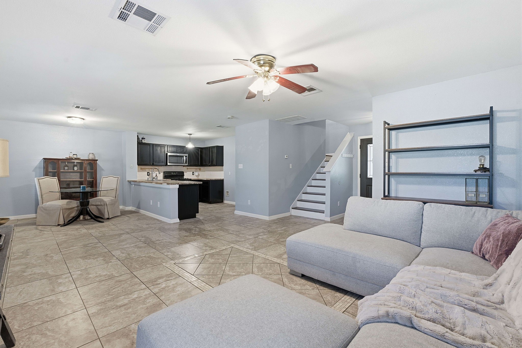 229 Black Forest Road Buda, TX 78610 - Photo 6 of 32 a living room with furniture and kitchen view