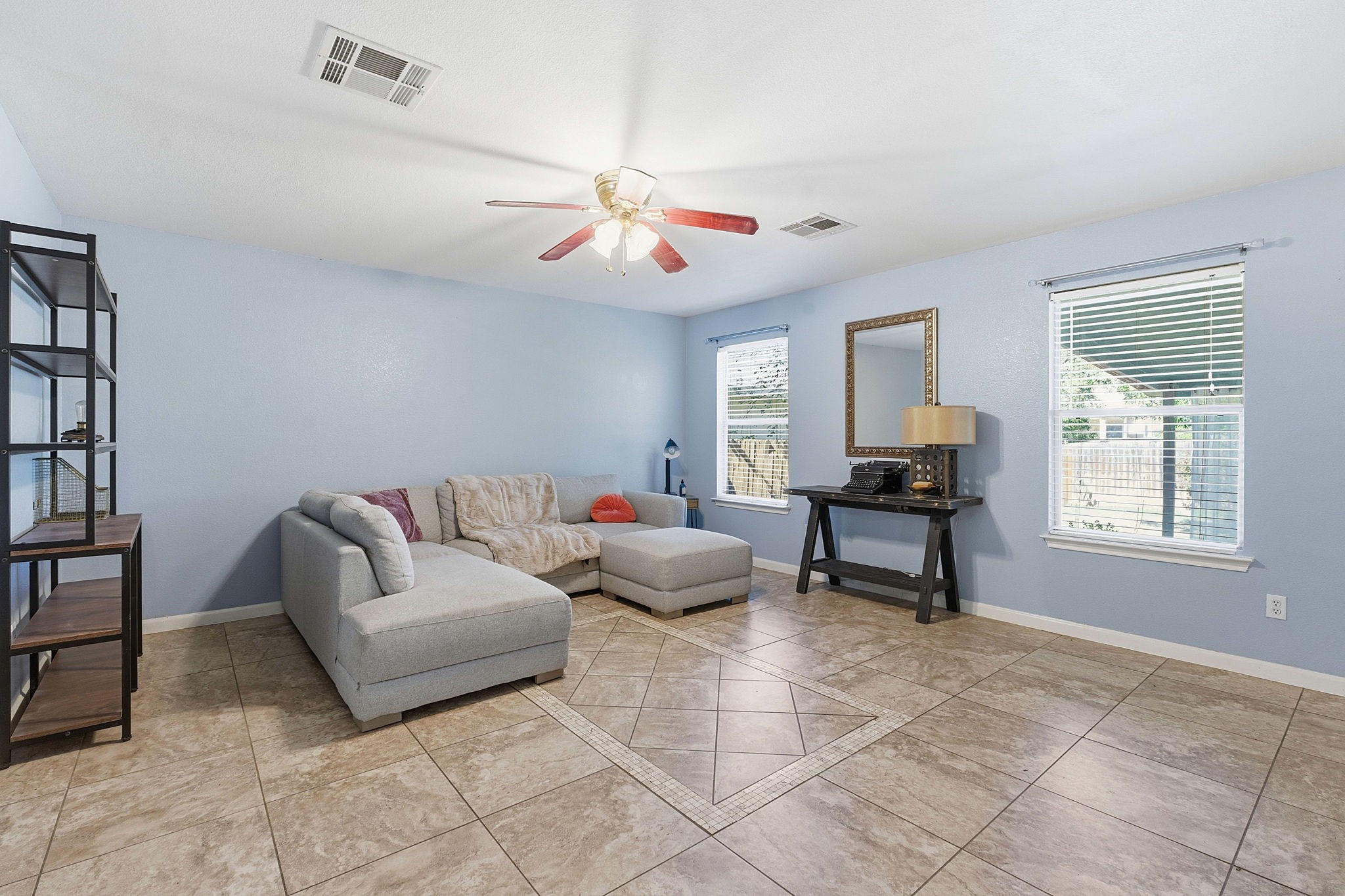 229 Black Forest Road Buda, TX 78610 - Photo 7 of 32 a living room with furniture and a window