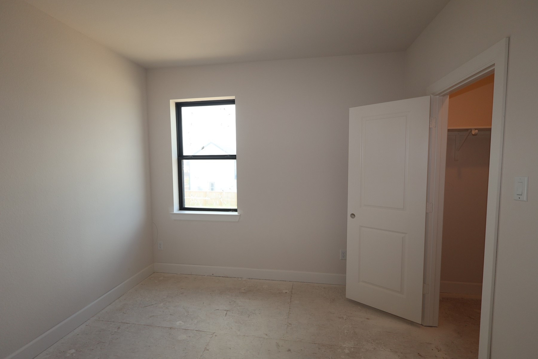 2714 Cottage Place Rosharon, TX 77583 - Photo 9 of 20 an empty room with windows
