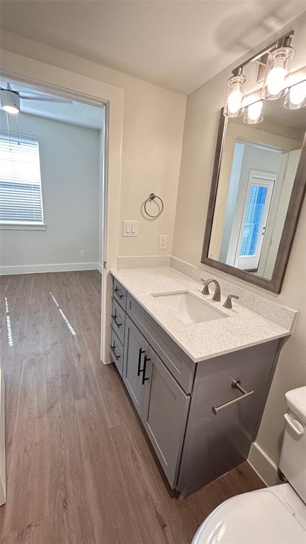 5317 Reiger Avenue, Unit 204 Dallas, TX 75214 - Photo 8 of 11 a bathroom with a sink and a mirror