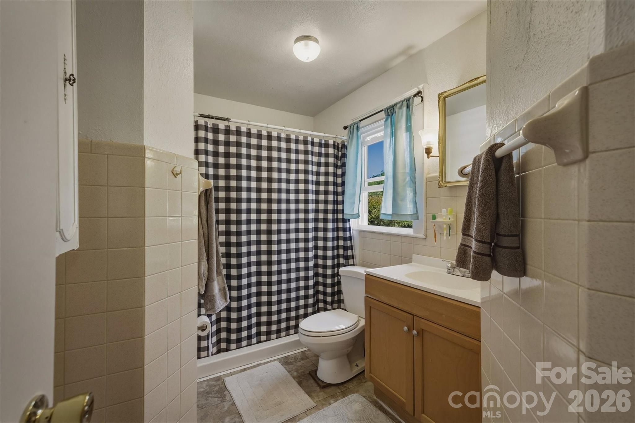 117 3rd Avenue Southwest Hickory, NC 28602 - Photo 18 of 21 a bathroom with a sink toilet and shower
