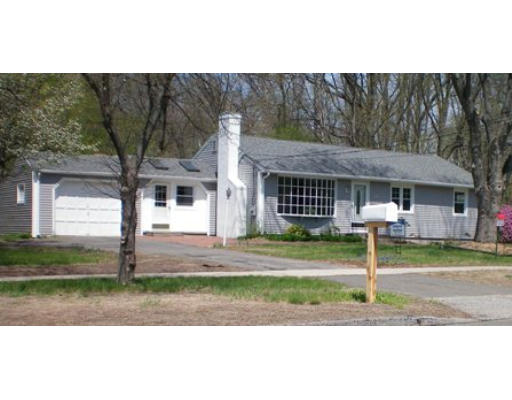 408 Wolf Swamp Road Longmeadow, MA 01106 - Photo 1 of 14 a front view of a house with a yard