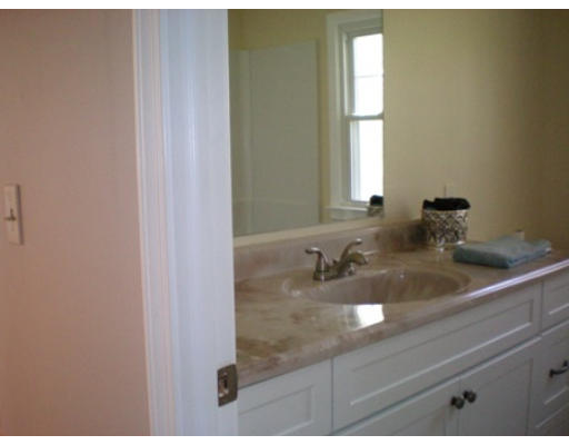 408 Wolf Swamp Road Longmeadow, MA 01106 - Photo 13 of 14 a bathroom with a sink and a mirror