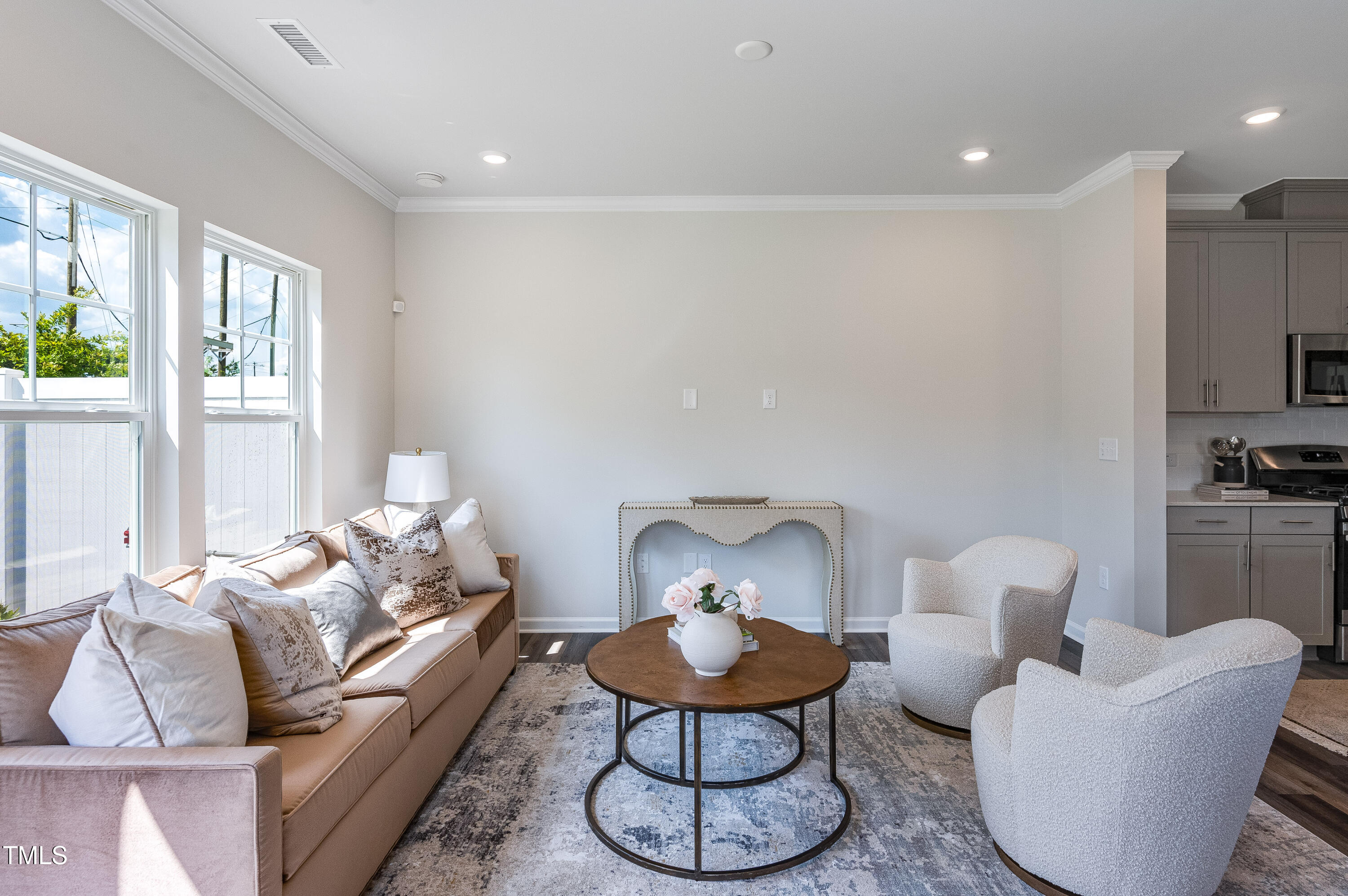 2210 Titanium Rock Road Durham, NC 27704 - Photo 14 of 27 a living room with furniture and a fireplace
