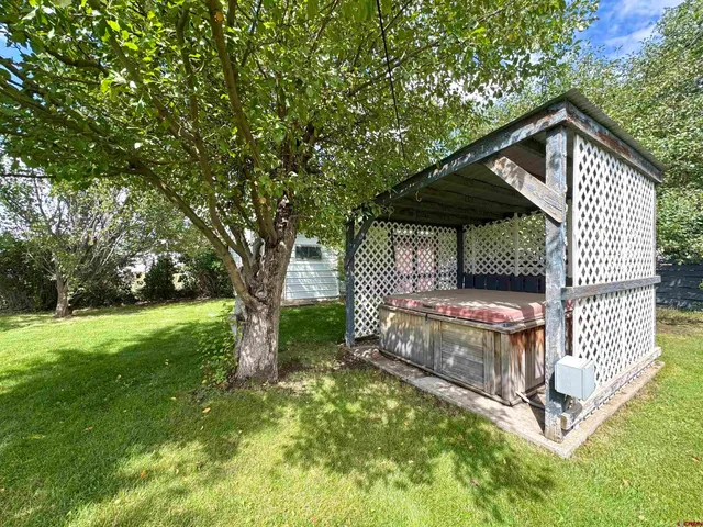 a view of a small yard in front of a house