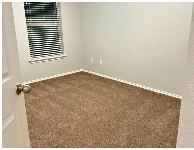 a view of a room with a window