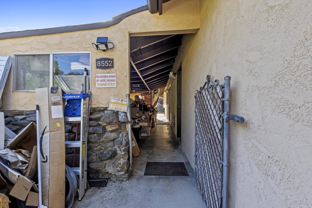 8552 Brodie Lane Santee, CA 92071 - Photo 16 of 40 a view of a livingroom with stairs
