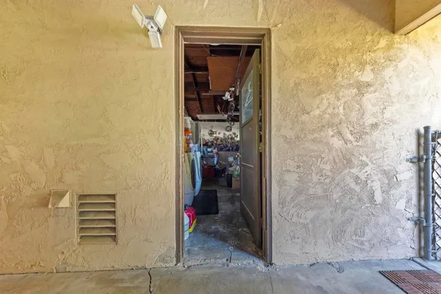 a view of a house with a small yard