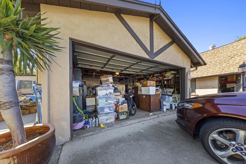 8552 Brodie Lane Santee, CA 92071 - Photo 19 of 40 a view of parking garage with cars