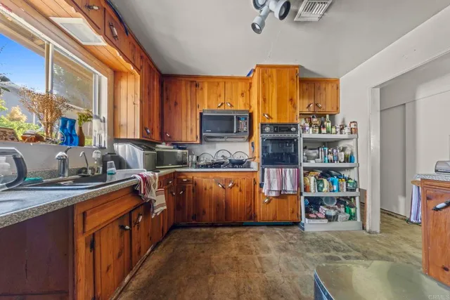 a view of a hallway with entryway
