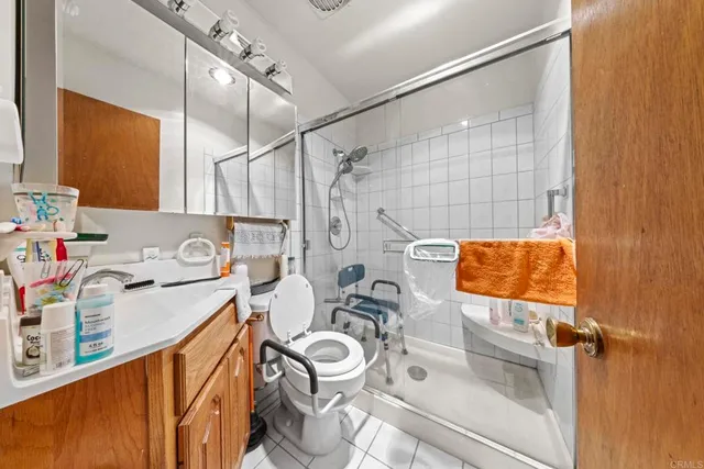 a bedroom with bed and a window