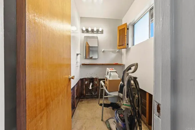 a view of a workspace with furniture