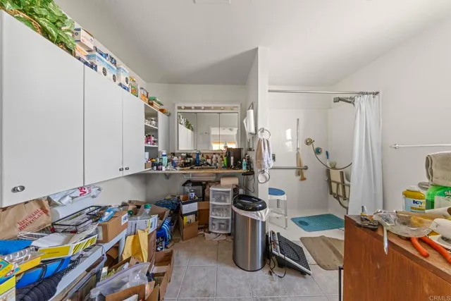 a bed room with furniture and a window