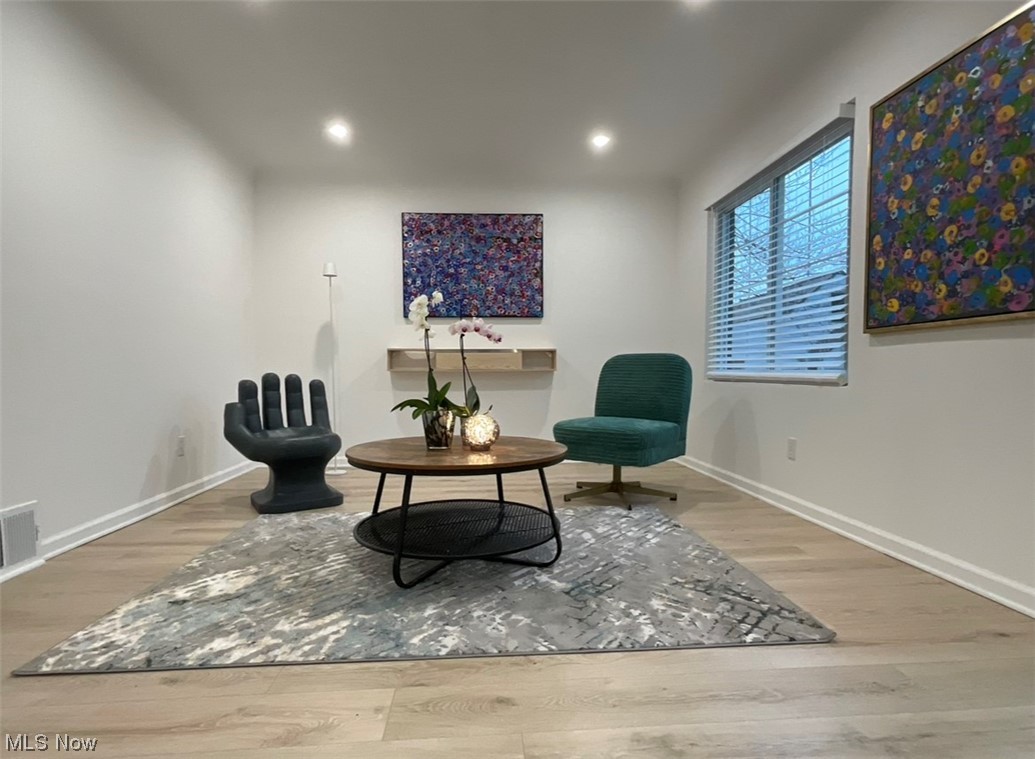 6303 Hillside Road Independence, OH 44131 - Photo 2 of 14 Living area with light hardwood / wood-style flooring
