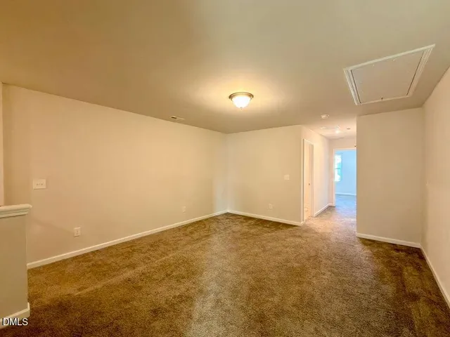 an empty room with a natural light