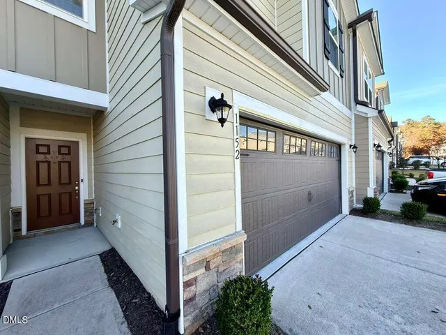 a view of a porch with a bench
