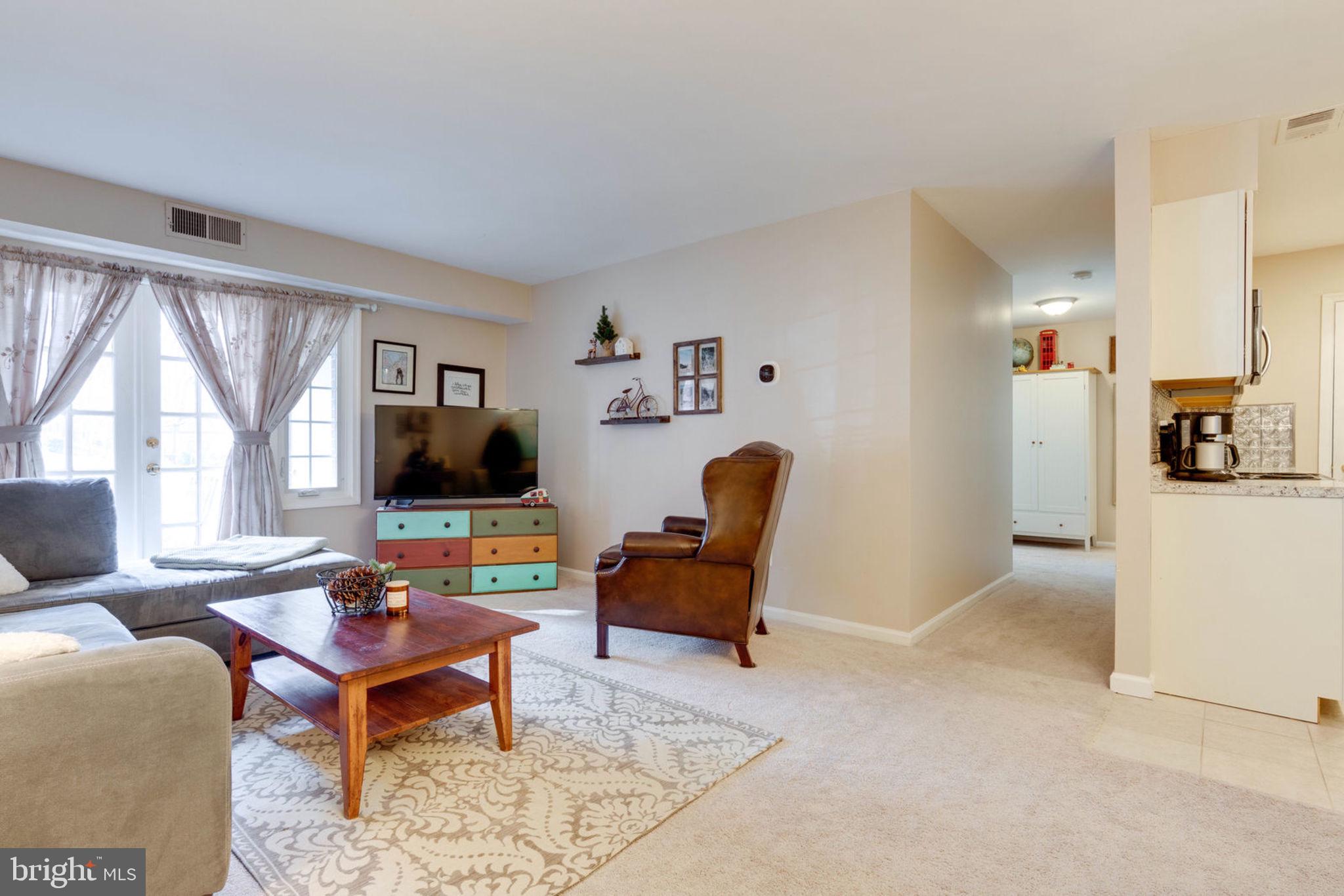 5905 Noblestown Road, Unit 52 Springfield, VA 22152 - Photo 4 of 31 Living Room with attached Dining Room