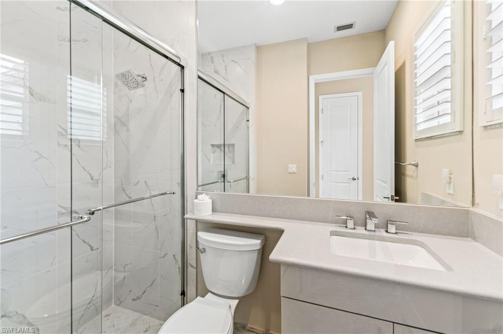 12033 Azalea Way Naples, FL 34120 - Photo 20 of 46 2nd bathroom